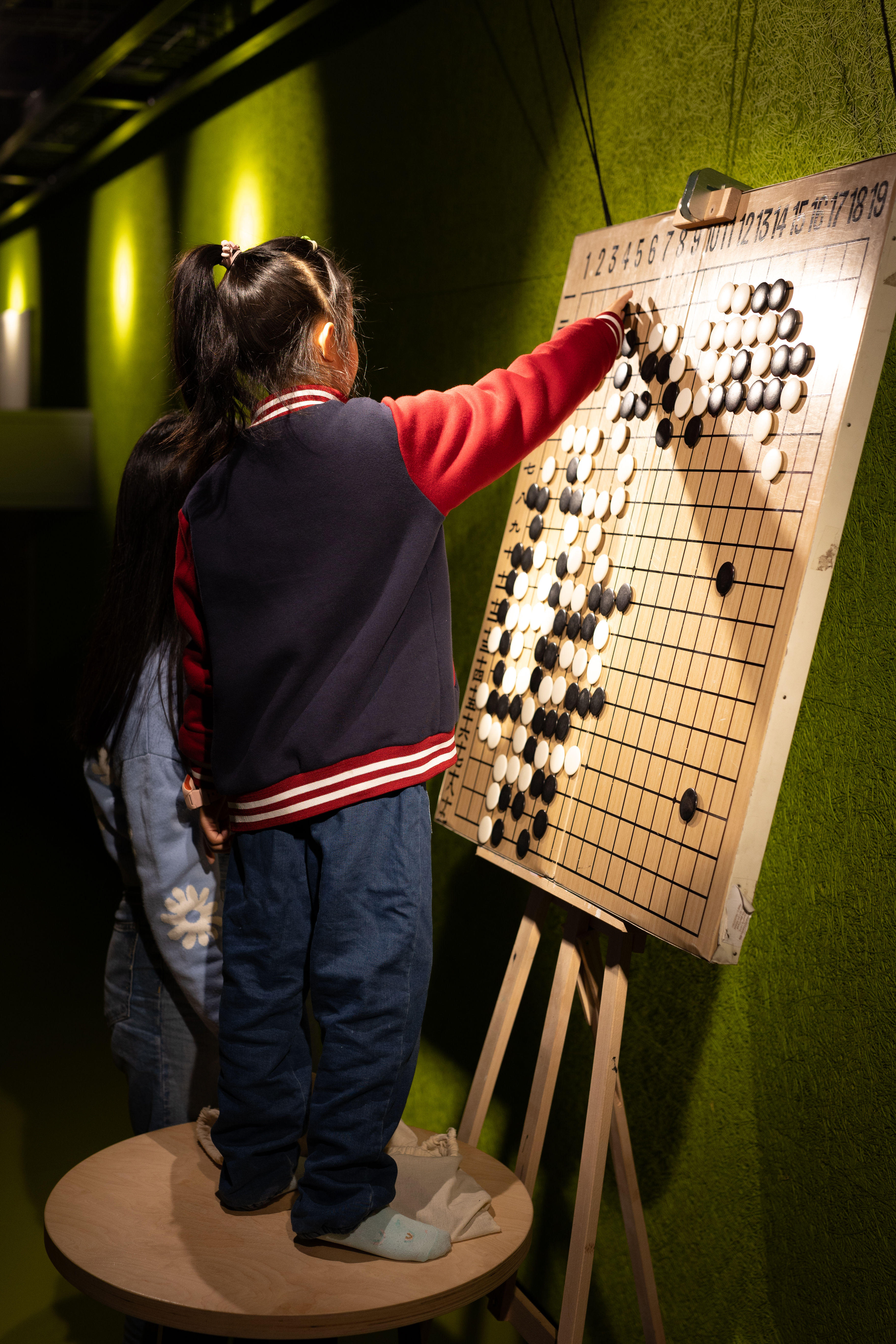 Kids reviewing the game on magnetic board :)